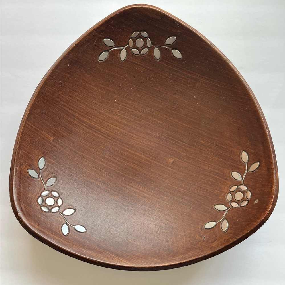 Wooden serving dish with metal leaf details